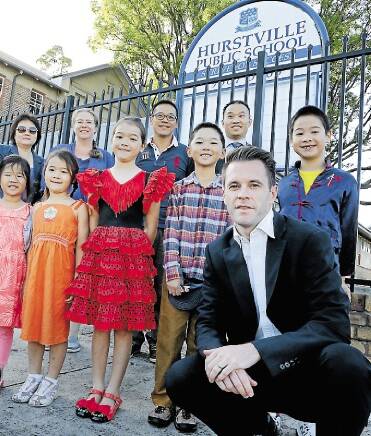 Chris Minns with pupils and parents at Hurstville Public School. Picture: Jane Dyson