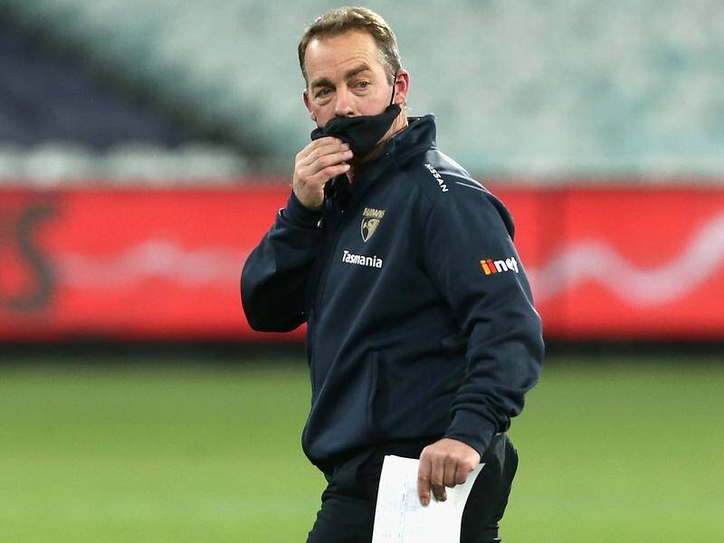Coach Alastair Clarkson has reaffirmed he will see out his contract with Hawthorn to the end.