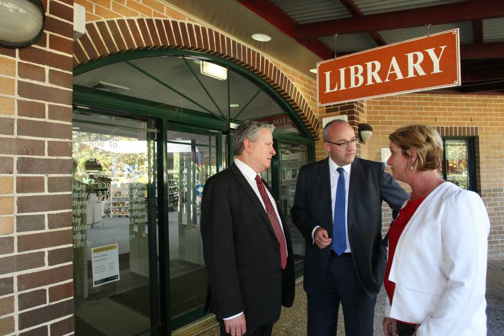 Election campaign: Luke Foley, at Menai Library with candidates Maryanne Stuart and Greg Holland, details Labor's plan to provide more funding for libraries. Picture: Chris Lane