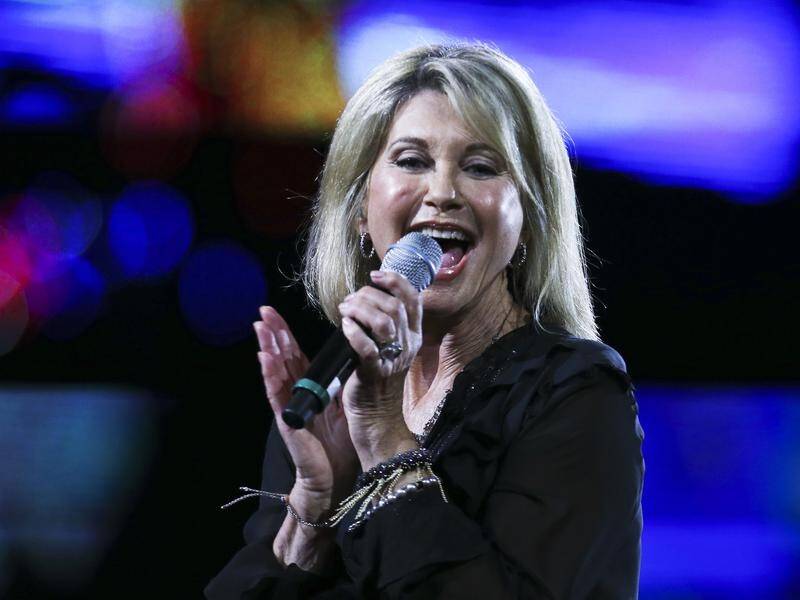 Olivia Newton-John receives the Companion of the Order of Australia (AC) for her community service.