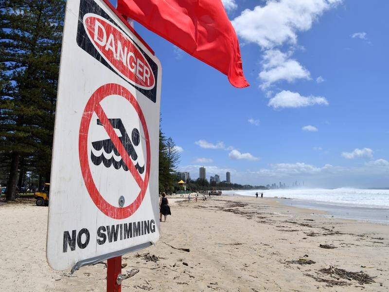 Ex-cyclone Oma has been downgraded but dangerous conditions at some beaches remain.