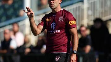 Queensland's State of Origin team have been soaking up tips and advice from Cameron Smith (pic).