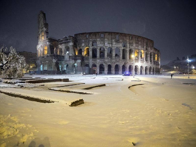 Snow has closed schools in Rome after the Italian capital was hit with a winter blast.