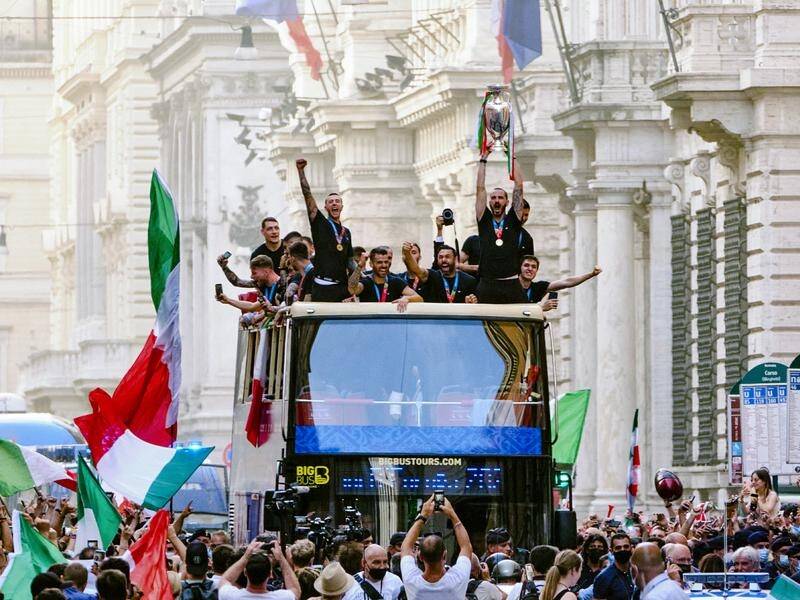 Italy's players celebrate in Rome their victory of the Euro 2020 soccer championships
