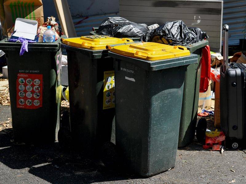 Delays caused by industrial action have left rubbish uncollected for days around the City of Sydney. (Bianca De Marchi/AAP PHOTOS)