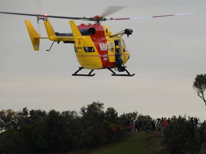 Three bodies were pulled from the water at Port Kembla after a search by police and lifeguards.