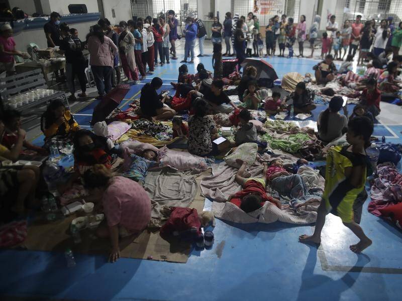 Thousands have taken shelter in schools and gymnasiums as Typhoon Noru hits the Philippines. (EPA PHOTO)