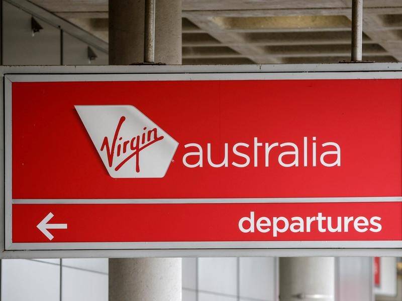 Virgin Australia cabin crew are planning 24-hour stoppages over the Christmas period. (Russell Freeman/AAP PHOTOS)
