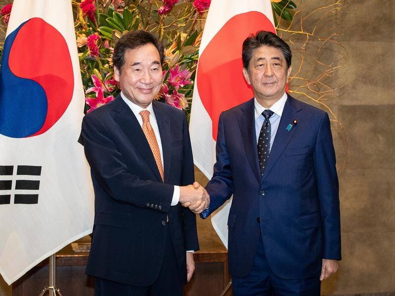 The Prime Ministers of Japan and South Korea have met for talks, at a low point in their relations.