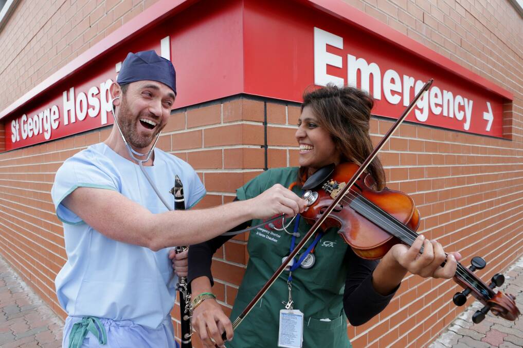 Doctors in tune: Medicos and musicians Andrew Kennedy and Saras Cauhan. Picture: Jane Dyson