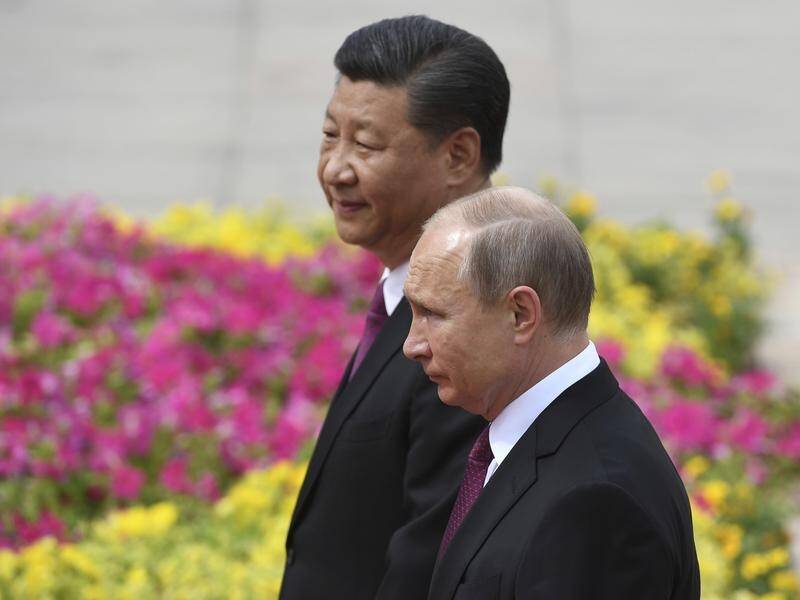Russian President Vladimir Putin and Chinese President Xi Jinping during a 2018 ceremony in Beijing.