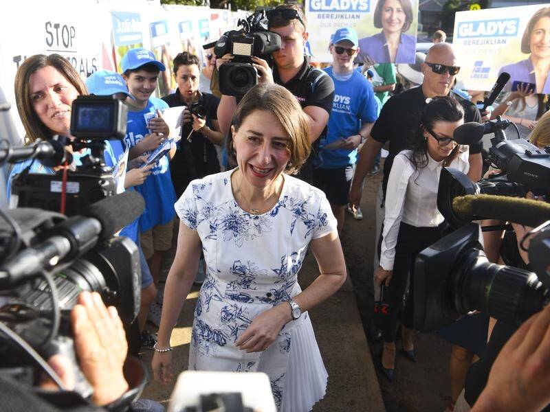 NSW Premier Gladys Berejiklian was accompanied by a scrum of media as she voted on Saturday morning.