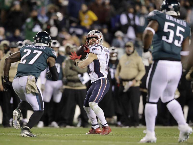 New England wide receiver Julian Edelman threw a touchdown pass in the NFL win at Philadelphia.