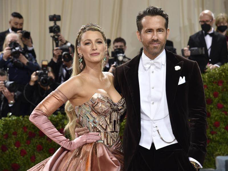 Blake Lively (l) and Ryan Reynolds arrive at the iconic Met Gala in New York.
