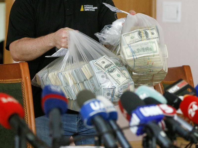 Ukrainian authorities say they have intercepted a bribe to drop a probe against the head of Burisma.