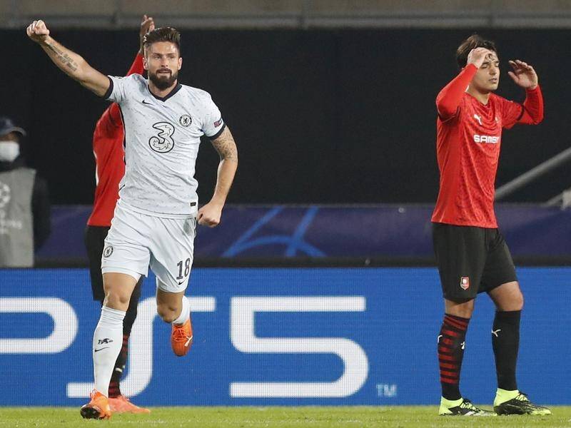 Olivier Giroud celebrates scoring the goal which sealed Chelsea's Champions League last 16 spot.