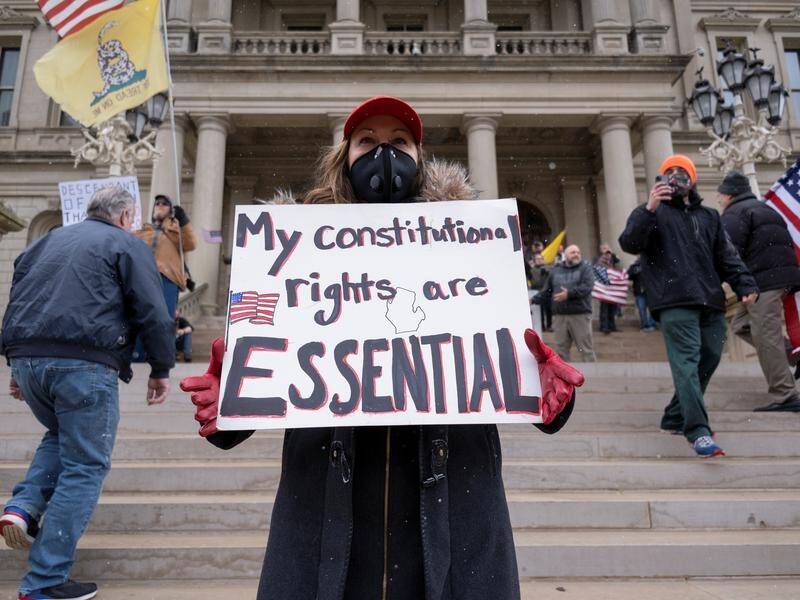 Resistance to social distancing measures has led to protests in Michigan, as the economy suffers.