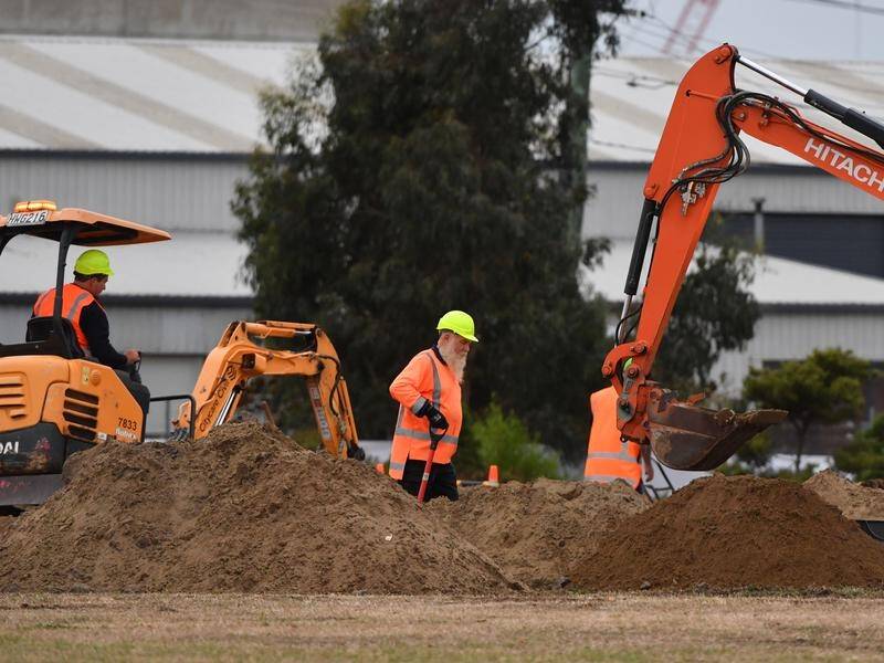 Workmen are continuing to dig series of graves at the Memorial Park Cemetery in Christchurch.