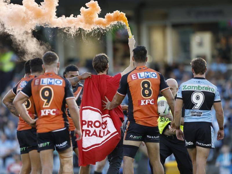 Andrew George has been jailed for three months for carrying a flare onto the field at an NRL match.
