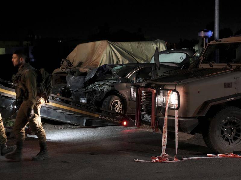Israeli forces say a Palestinian driver rammed his car into a group of Israelis in the West Bank. (AP PHOTO)