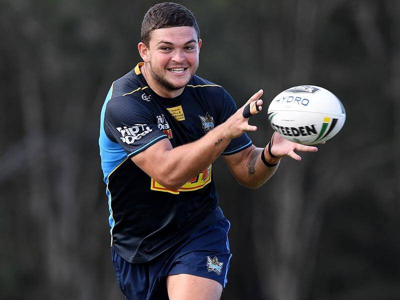 Halfback Ashley Taylor is back training with Gold Coast after a break from the NRL.