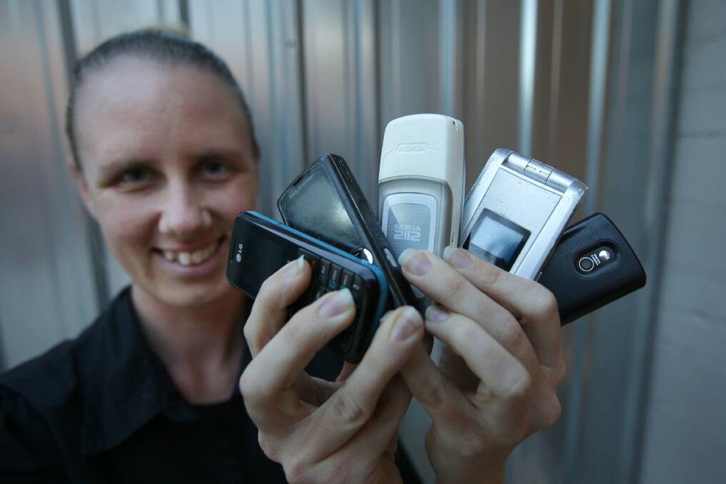 Get rid of that old mobile: Jacky Peile is urging people to recycle their old phones to MobileMuster. Picture: John Veage