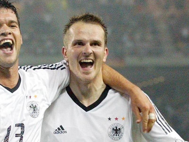 Former German and EPL soccer star Dietmar Hamann (right) is accused of assaulting a woman in Sydney.