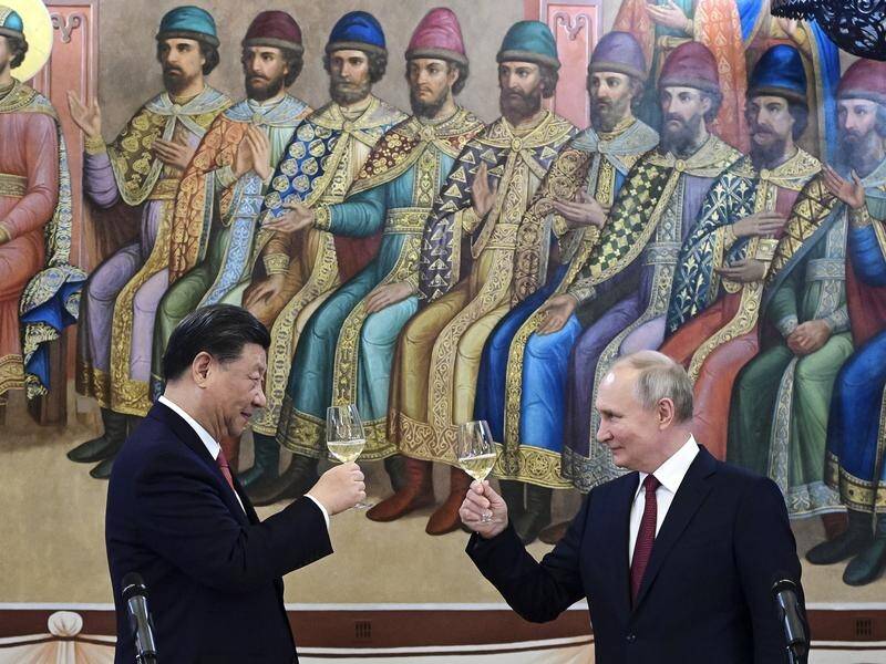 Xi Jinping and Vladimir Putin described their countries' relations as the best they have ever been. (AP PHOTO)