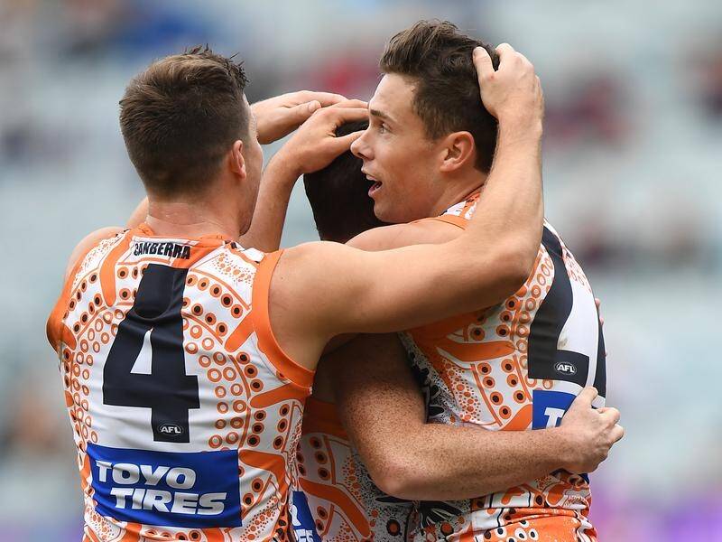 Josh Kelly (right) has full faith his GWS Gians teammates will continue to overcome injury problems.