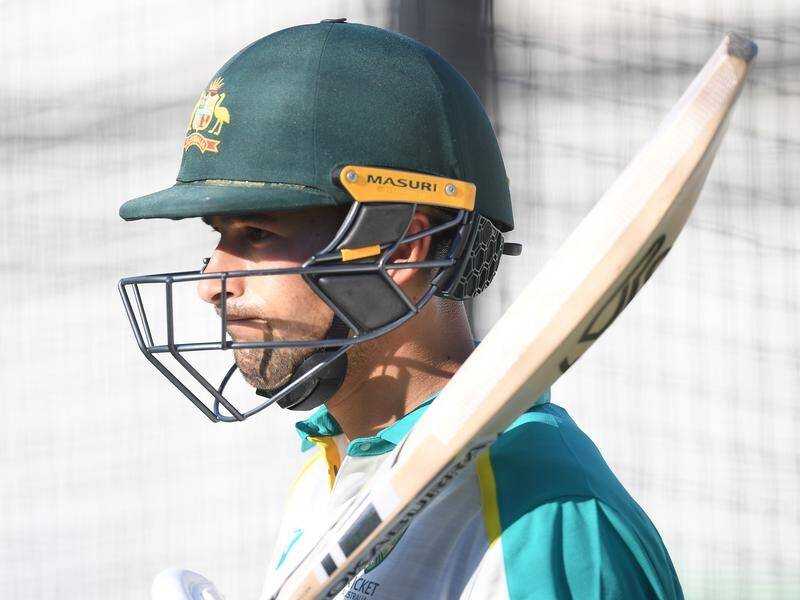 Ashton Agar is happy to go in to bat for coach Justin Langer, who has come in for criticism.