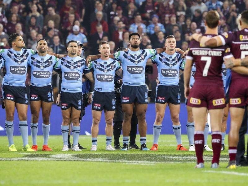 Much like in Origin I (pic) a number of players did not sing the national anthem in match two.
