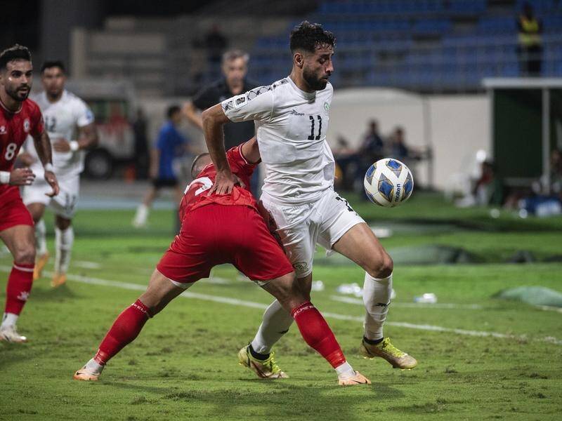 Oday Dabbagh (11) in action for Palestine in their World Cup qualifier against Lebanon last week. (AP PHOTO)