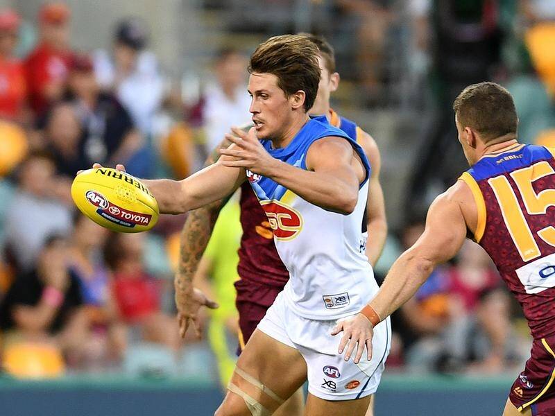 Gold Coast have held out Brisbane to win their AFL derby at the Gabba by five points.