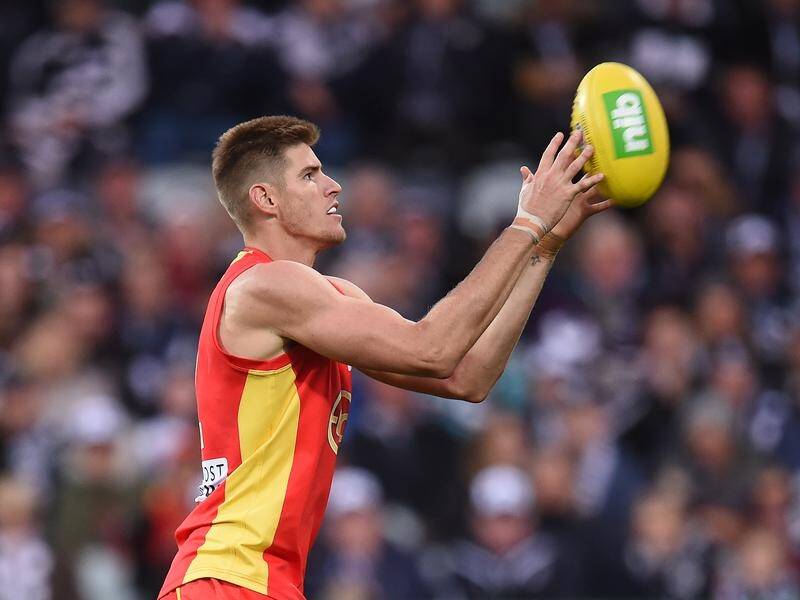 Gold Coast ruckman Zac Smith is ready to fill a void for the Suns on his return to the AFL club.
