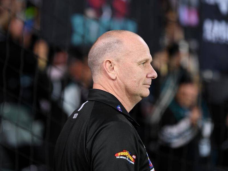 Ken Hinkley has been named AFL coach of the year after taking Port Adelaide to a preliminary final.