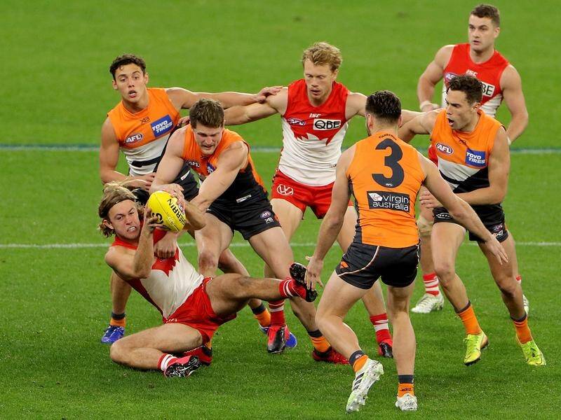 James Rowbottom (BL) was among Swans and Giants players called up after teammates had to isolate.