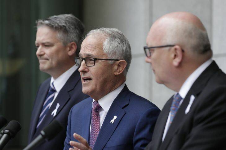 Prime Minister Malcolm Turnbull addresses the media during a joint press conference with Finance Minister Mathias Cormann and Attorney-General George Brandis, at Parliament House in Canberra on Tuesday 5 December 2017. fedpol Photo: Alex Ellinghausen