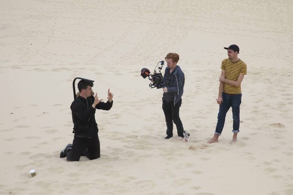 Dunes scene: Cinematographer Jack McAvoy (from left), camera assistant Tim Fay and Peter William Francis.