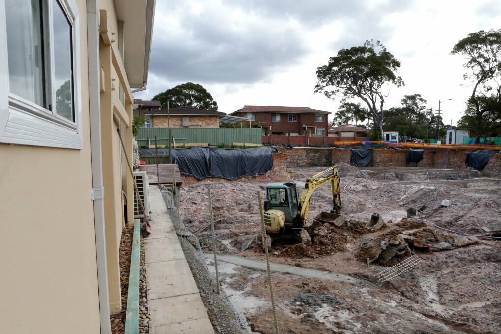 Sinking feeling: Marilyn Batman's side lane and fence collapsed into the development site next door. She is blaming Sutherland Shire Council for allowing excavation right up the the boundary. Picture: Jane Dyson