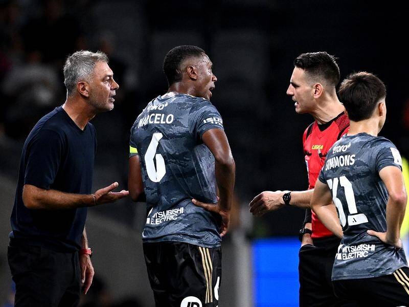 Wanderers coach Marko Rudan (left) has been hit with a show-cause notice for comments to officials. (Dan Himbrechts/AAP PHOTOS)
