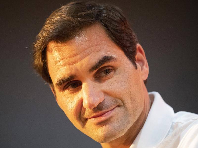 Roger Federer has taken on a wall to show off his trick shots at his home in Switzerland.