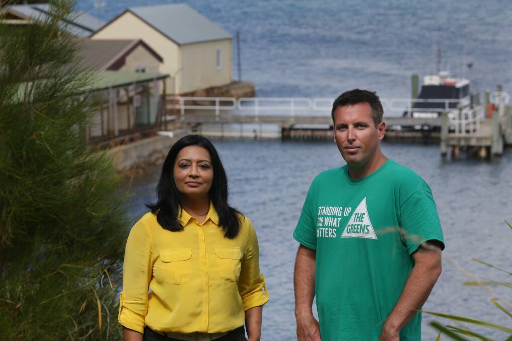 Three years on: Mehreen Faruqi and Nathan Hunt with the former Fisheries centre in the background.