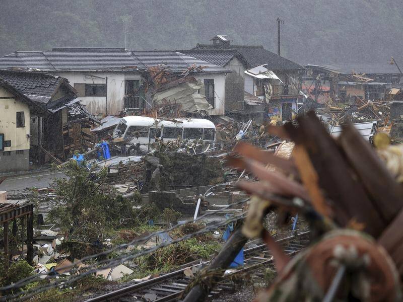 The death toll from flooding in southern Japan has risen to 50.