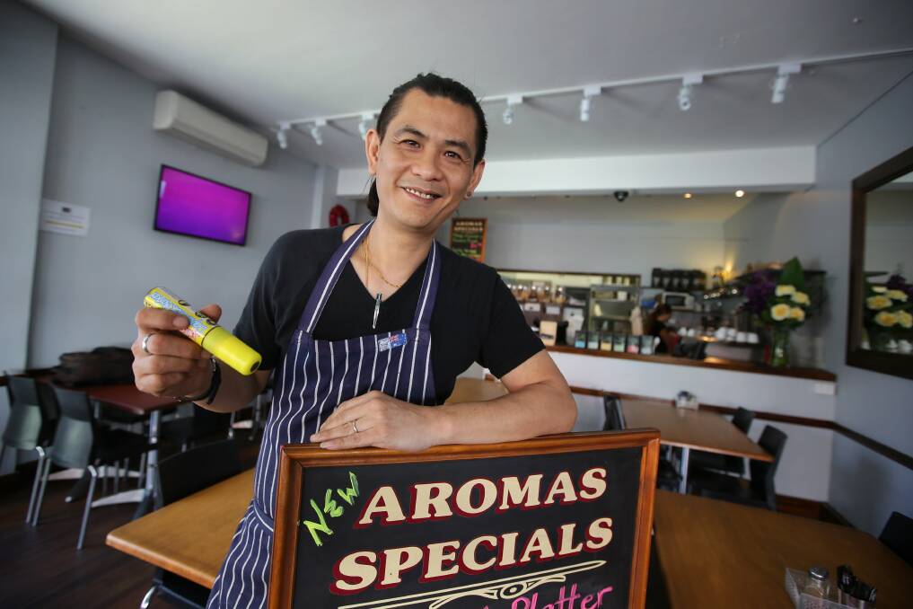 Starting over: David Lee at his New Aromas Cafe, Gymea. Picture: John Veage