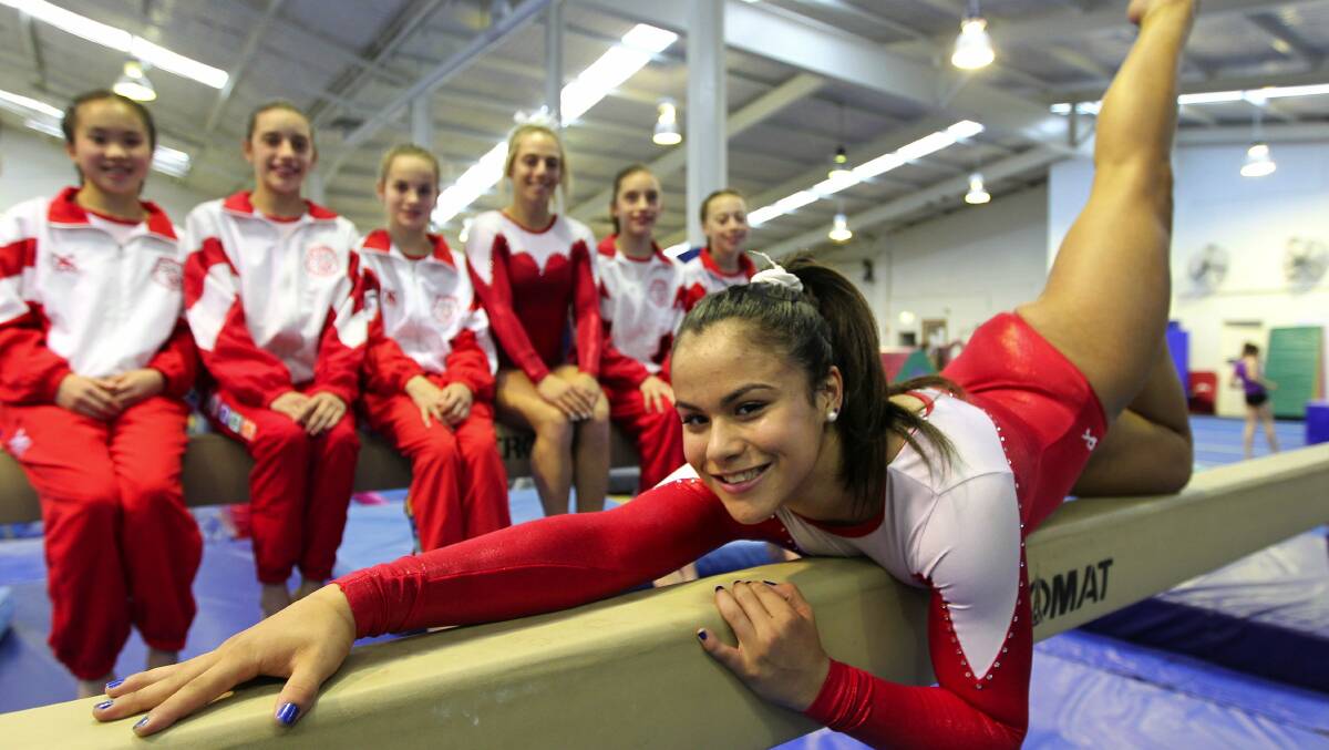 Talented athletes: NSW Academy of Gymnastics competitors Elise Baxter (front) and (from left) Kiara Wark, Sage Anderson, Maddison Daley, Stephanie Magiros, Tess Anderson and Jaymi Aronowitz at the Bill Parsons Miranda academy. Picture: John Veage