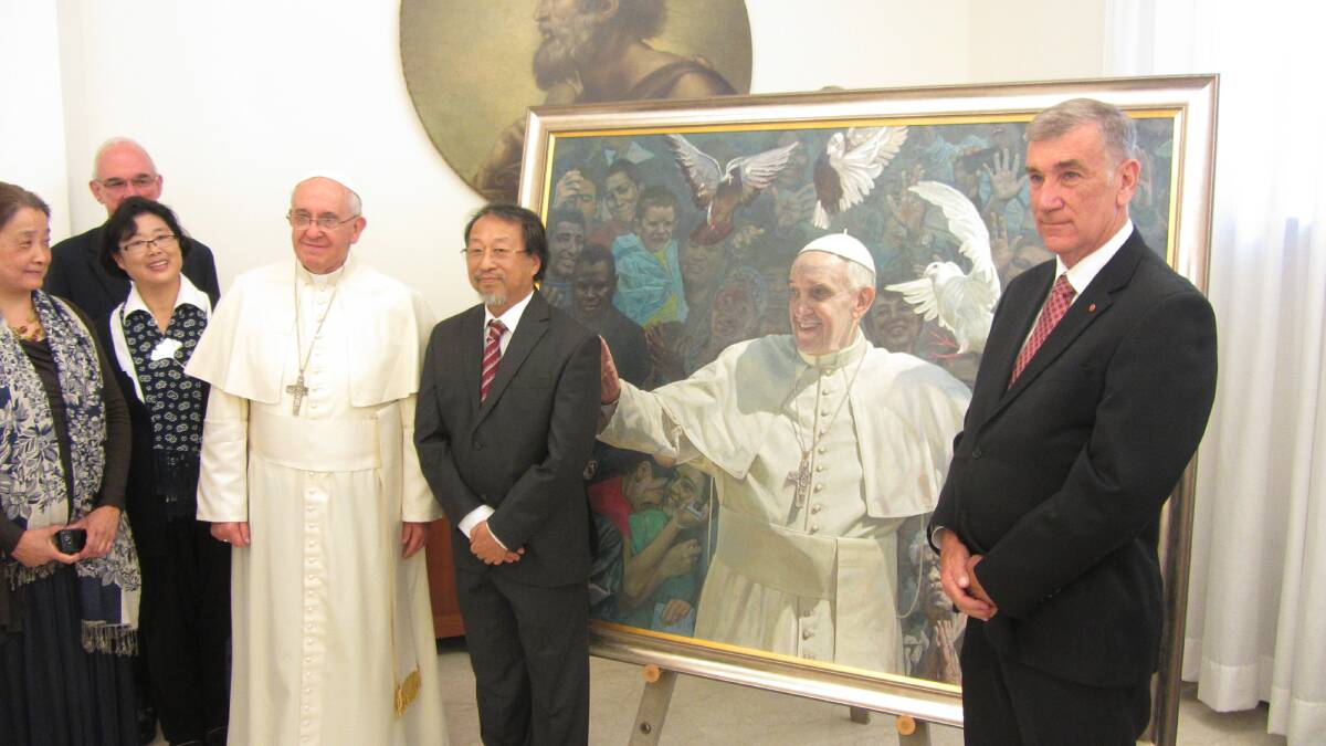 Moment of glory: Pope Francis was reportedly "delighted" with his portrait, painted by Sutherland Shire artist Jaiwei Shen. They are pictured with president of the Australian senate, John Hogg. Picture: Supplied
