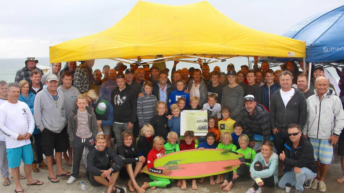 Making waves: Surfing Sutherland Shire and Sutherland Council have erected another plaque on the Esplanade walk at Elouera. Pictured are Mayor Carmelo Pesce and members celebrating the 35th year of Elouera boardriders.

