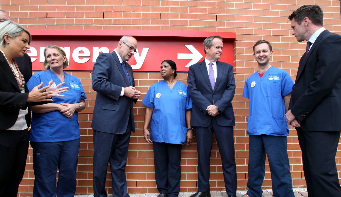 More nurses: Bill Shorten and Luke Foley with nurses Pam Illingworth, Pushpa Prasad and Michael Kirby and candidates O’Bray Smith and Chris Minns. Picture: Jane Dyson

