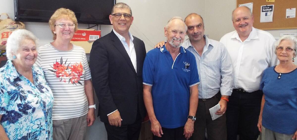 Money in bank: John Ajaka (third from left), Carl Piraino (third from right), Lee Evans (second from right) with John (instructor) and members of the Tai Chi group run at the centre. Picture: supplied
.
