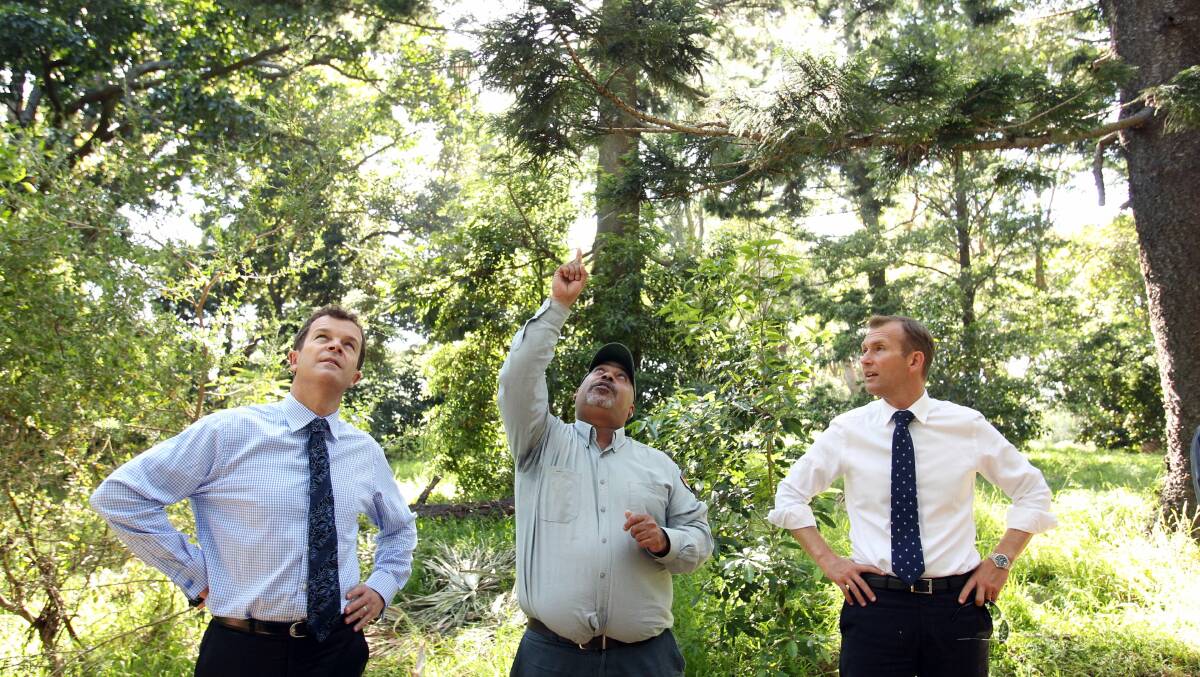 New role: New Environment and Assistant Planning Minister Mark Speakman (left) is pictured with former Environment Minister Rob Stokes and a NPWS guide during the announcement of an upgrade of Kamay Botany Bay National Park. Picture: Chris Lane

